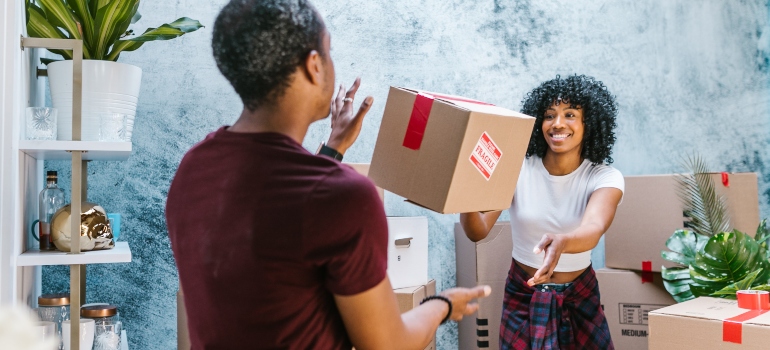 two people packing