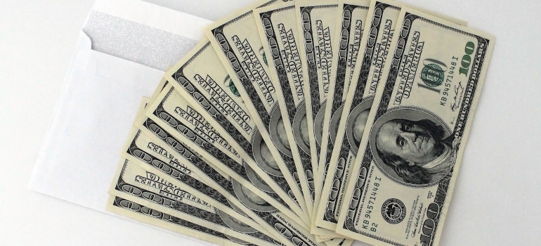 Once you set a budget for your Long Beach move you will need a lot of dollar bills like these