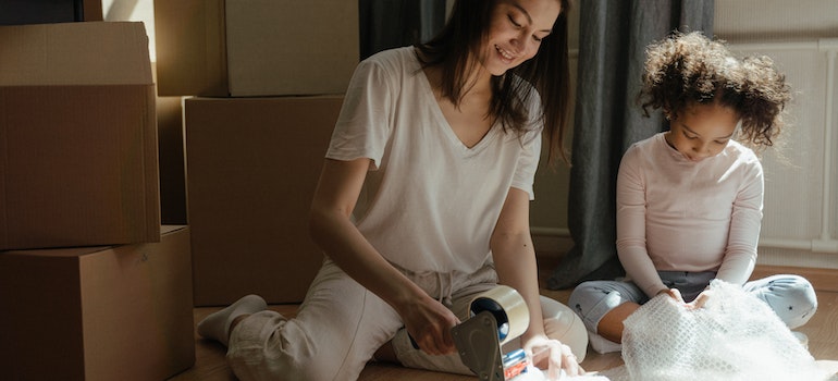 mom and daughter preparing for a move