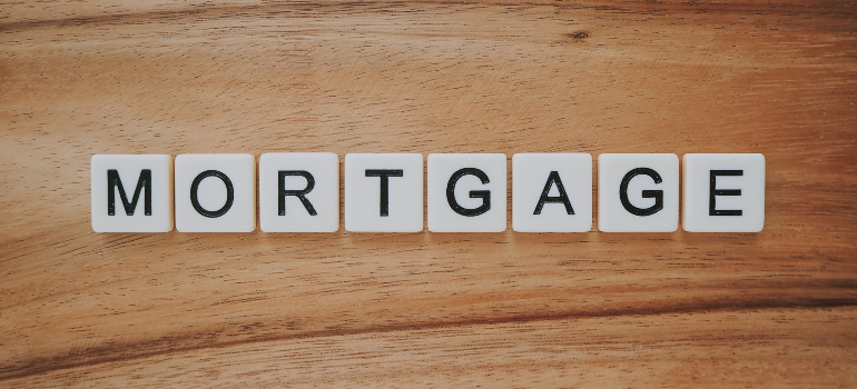 the word "mortgage", written in block letters