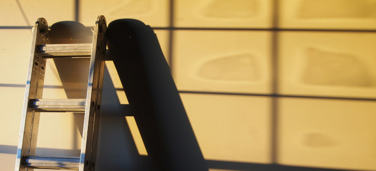 a metal ladder in sunlight