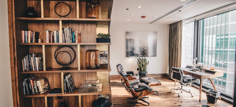 wooden floor-to-ceiling shelves that can be one of the creative storage solutions for your new Costa Mesa apartment