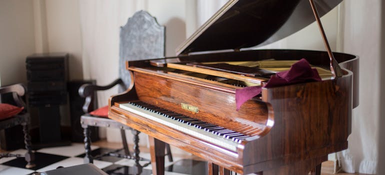 a brown grand piano 