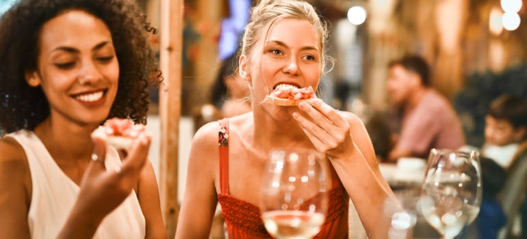 two women having dinner in a restaurant