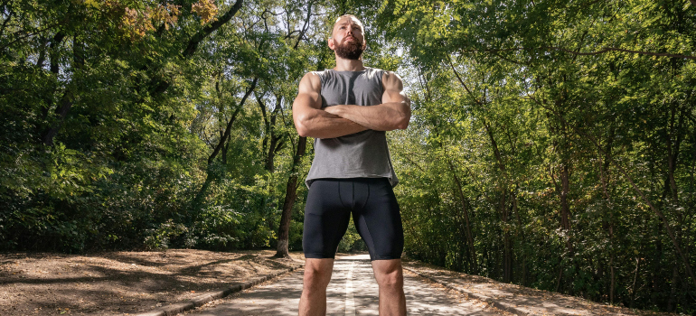 a man jogging in the forest to live a healthy life in Aliso Viejo