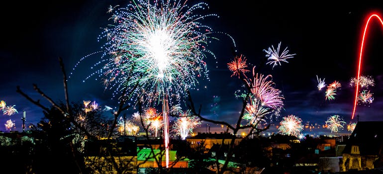 fireworks above the city at night