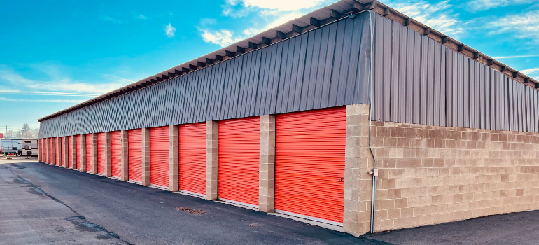 several storage units with red doors