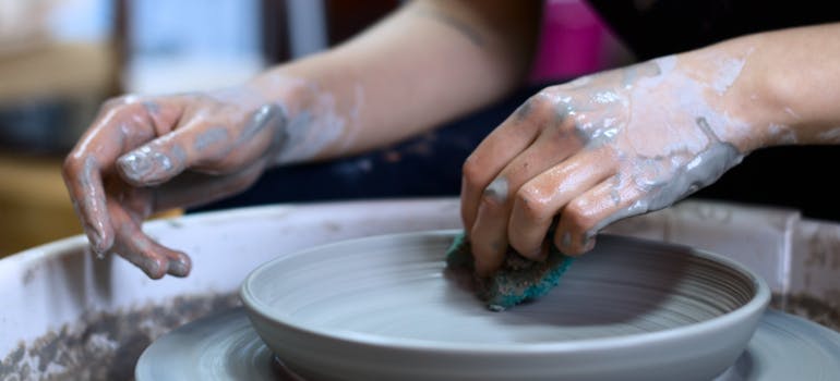 a person making pottery