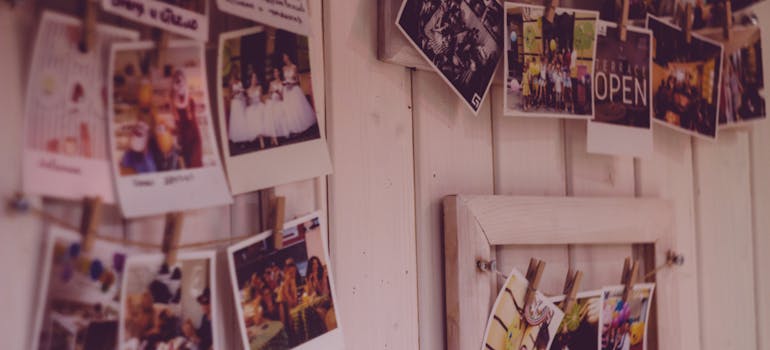 photographs displayed on a white wall