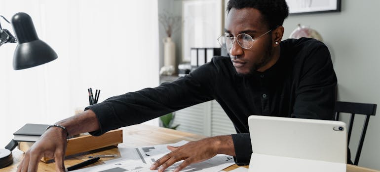 a man going through some paperwork 