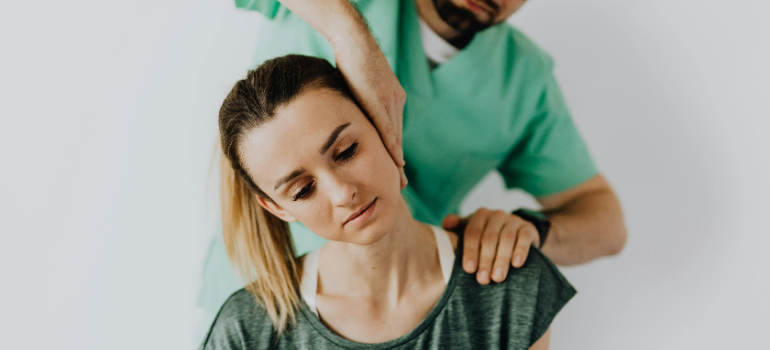 a doctor helping a person 