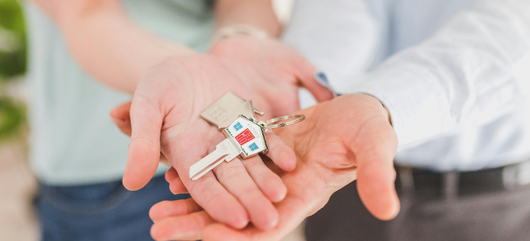 people holding keys 