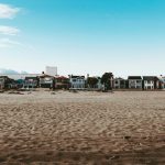 a row of houses on the beach in the city of Newport Beach, OC